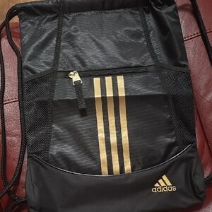 Adidas Black and Gold Drawstring Bag